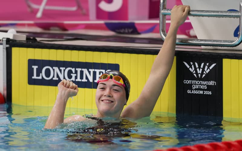 GLASGOW, SCOTLAND - JULY 25: Erika Fairweather of Team New Zealand celebrates after taking Bronze in the Women’s 200m Freestyle on day two of the Glasgow 2026 Commonwealth Games at Tollcross International Swimming Centre on July 25, 2026 in Glasgow, Scotland. (Photo by Ian MacNicol/Getty Images)