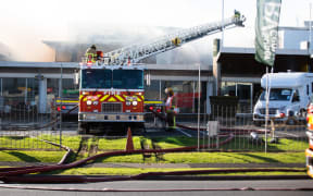 Firefighters battle a blaze that broke out at Maui campervan rental facility in Māngere, South Auckland on the morning of 3 September.