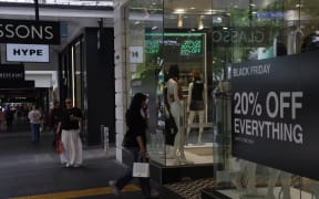 shopping and shoppers generic on Queen Street in downtown Auckland Black Friday 29 November 2024 .