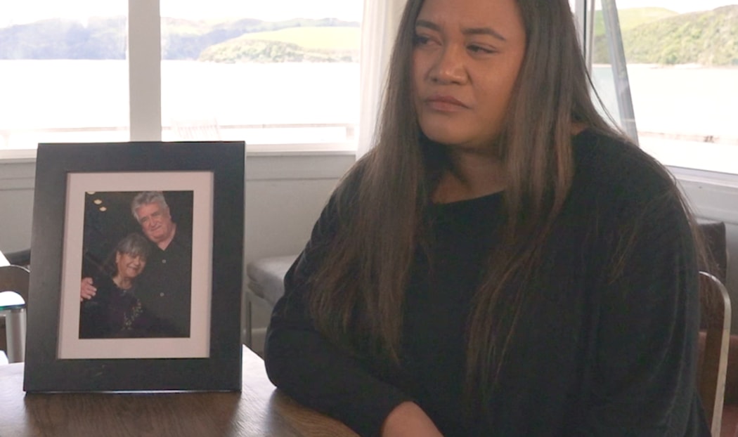 Jo Kutukai with a photo of her parents, Mona Tuwhangai and Maurice O'Donnell. They were both killed by Ross Bremner.