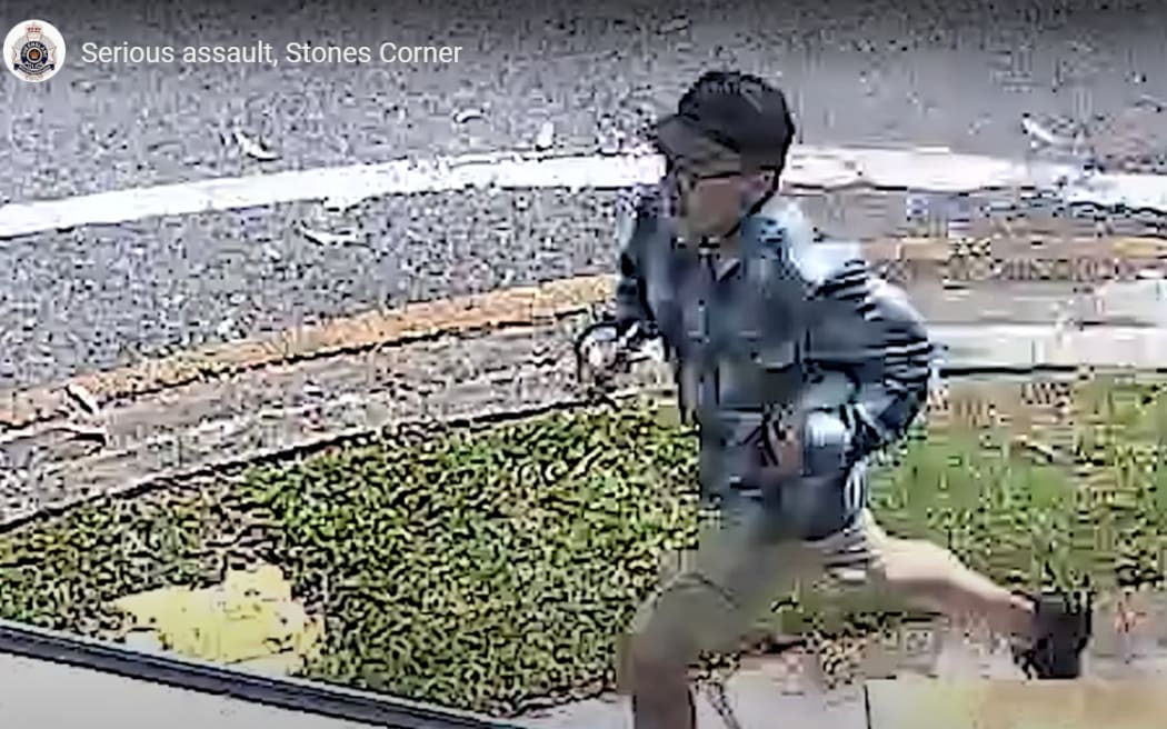 An image from footage released by Queensland Police in the search for a man believed to be responsible for a serious assault on a baby.