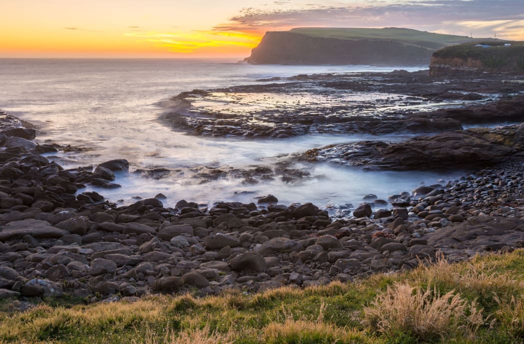 Golden sunset at Curio Bay, the Catlins, New Zealand