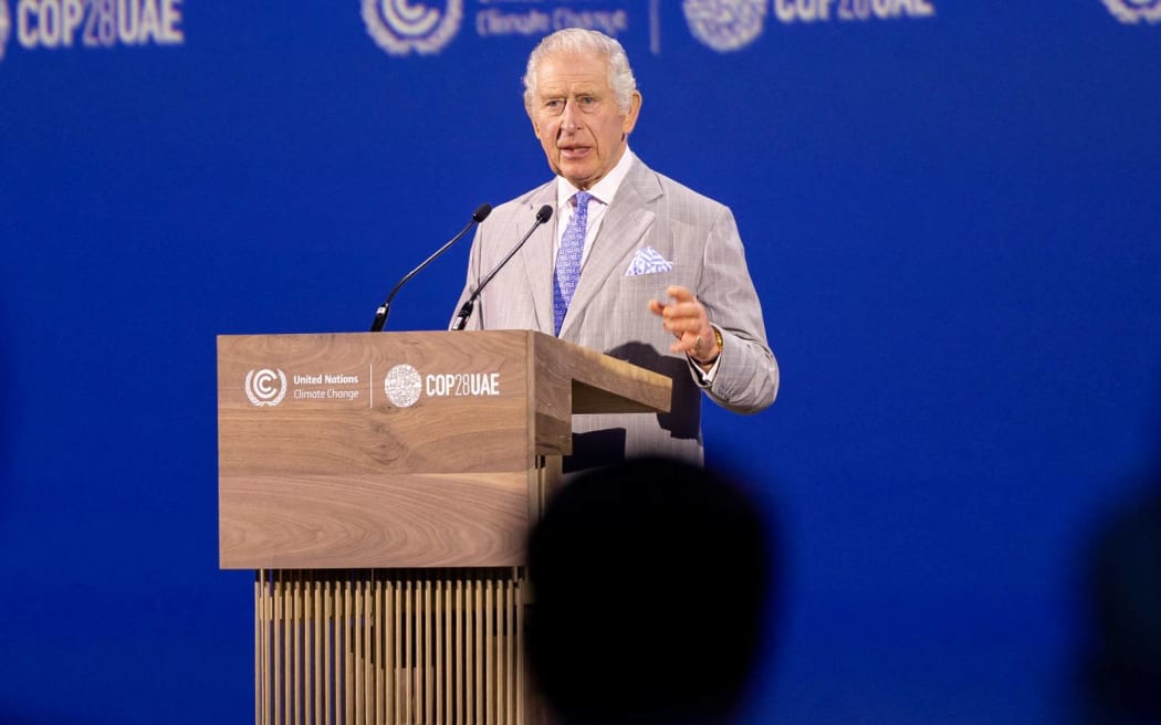 A handout picture provided by the UAE Presidential Court shows Britain's King Charles III delivering an address during the opening ceremony of the COP28 Summit at Dubai's Expo City on December 1, 2023. World leaders take centre stage at UN climate talks in Dubai on December 1, under pressure to step up efforts to limit global warming as the Israel-Hamas conflict casts a shadow over the summit. (Photo by Ryan CARTER / UAE PRESIDENTIAL COURT / AFP) / RESTRICTED TO EDITORIAL USE - MANDATORY CREDIT "AFP PHOTO / UAE PRESIDENTIAL COURT- NO MARKETING NO ADVERTISING CAMPAIGNS - DISTRIBUTED AS A SERVICE TO CLIENTS