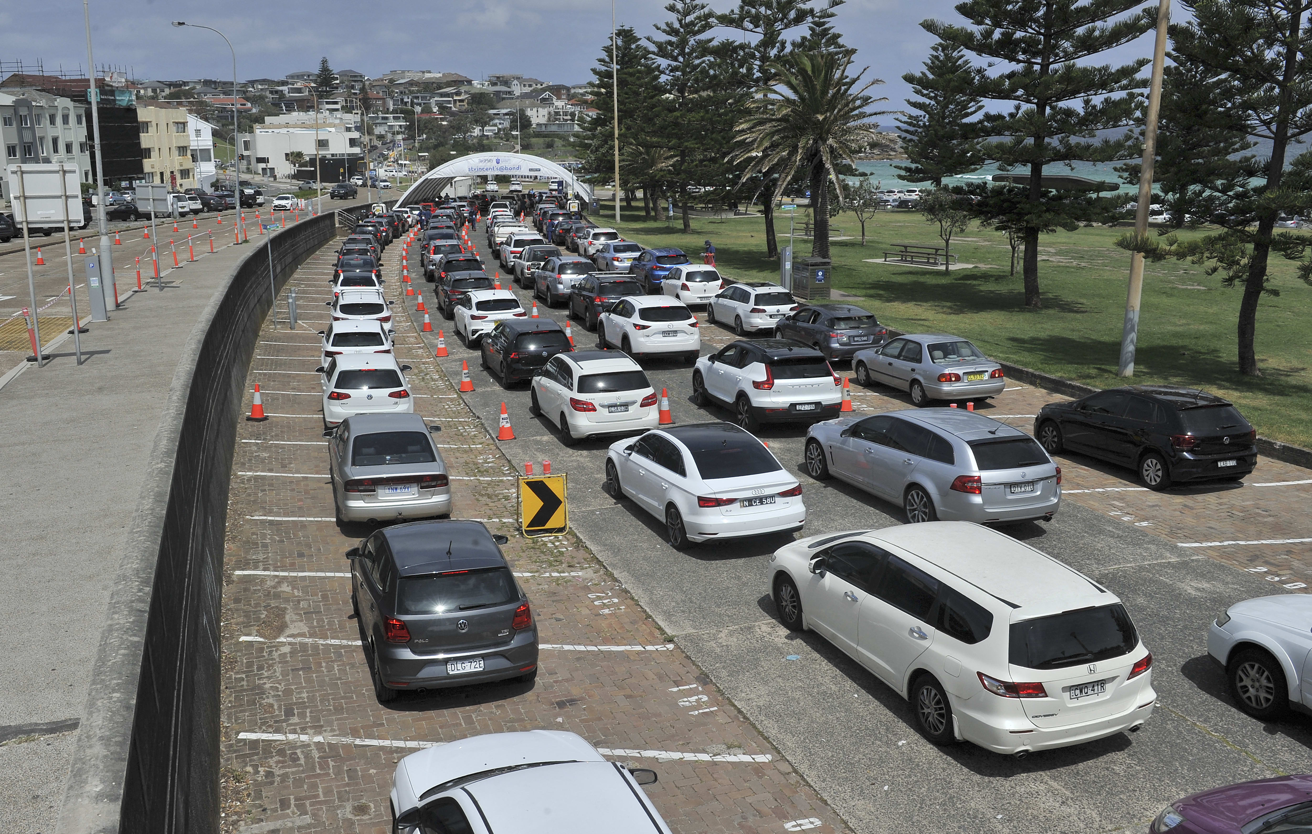 A queue for Covid-19 testing at Bondi Beach, Sydney, as Covid-19 cases keep on the rising across the state.