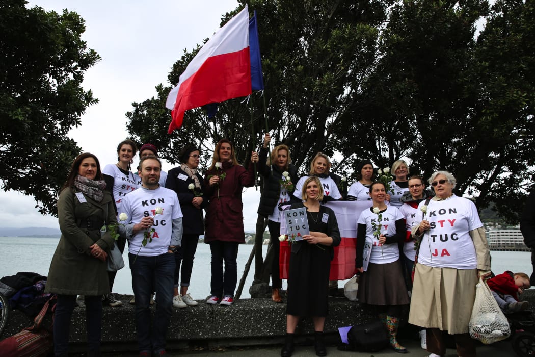 Protestors wore shirts with the Polish word for "constitution" on them.