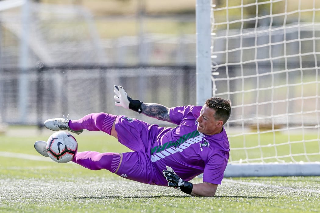 Lupe o le Soaga's Zane Green saves a penalty during the second half.