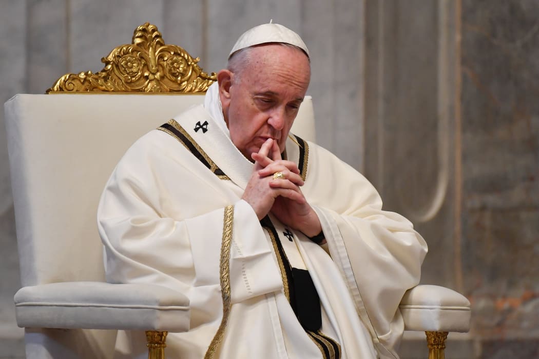 Pope Francis gathers his thoughts during Easter Sunday Mass on April 12, 2020 behind closed doors at St. Peter's Basilica in The Vatican.