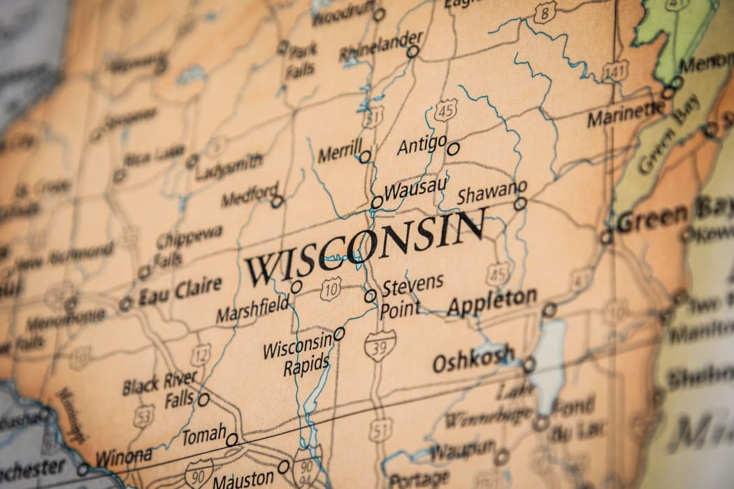 Closeup Selective Focus Of Wisconsin State On A Geographical And Political State Map Of The USA.