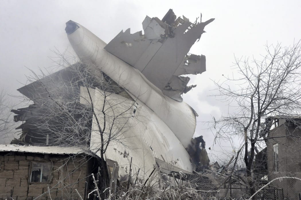 Wreckage of a plane is seen after the aircraft on a flight from Hong-Kong to Bishkek crashed during a landing approach due to bad weather conditions, near Bishkek, Kyrgyzstan on January 16, 2017.