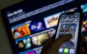 2022-01-19 12:42:43 ILLUSTRATIVE - Applications from streaming services Disney Plus, Amazon Prime Video, Apple TV, Videoland and Netflix on a phone. KOEN VAN WEEL (Photo by Koen van Weel / ANP MAG / ANP via AFP)