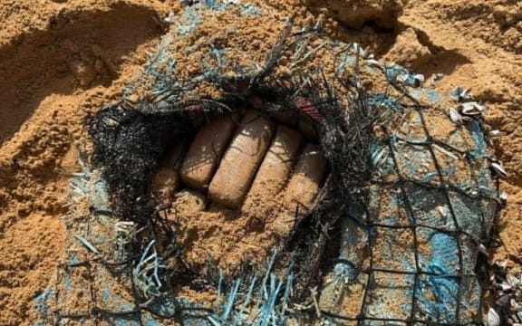 A package with barnacles growing on it, believed to hold about 40 kilograms worth of cocaine, has washed up on a Norfolk Island beach