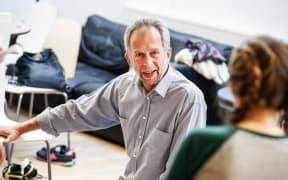 Adrian Jackson speaking to an actor