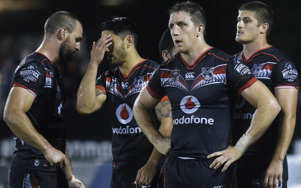 Warriors captain Ryan Hoffman and his dejected team mates.