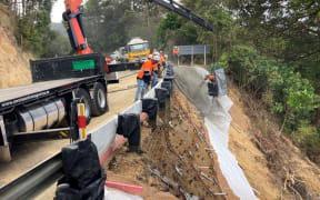 Works on the Brynderwyns section of SH1, a month after Cyclone Gabrielle. Huge efforts by hundreds of kaimahi (workers) was needed to repair the road.