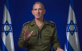 This screen grab taken from a handout video released by the Israeli army on October 26, 2024, shows military spokesman Rear Admiral Daniel Hagari calling on the Israeli people to be "alert and vigilant" as it carries out strikes on military targets in Iran. - Israel announced the launch of "precise strikes" on military targets in Iran on October 26, in retaliation for attacks against it, as Iranian state media reported several explosions around the capital. (Photo by Israeli Army / AFP) / === RESTRICTED TO EDITORIAL USE - MANDATORY CREDIT "AFP PHOTO / HANDOUT / ISRAELI ARMY' - NO MARKETING NO ADVERTISING CAMPAIGNS - DISTRIBUTED AS A SERVICE TO CLIENTS ==