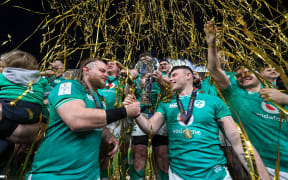 Ireland’s Finlay Bealham and Calvin Nash celebrate winning the 2024 Six Nations.