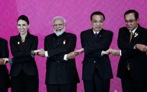 ASEAN leaders (L to R) Prime Minister Jacinda Ardern, Indian Prime Minister Narendra Modi, Premier of the State Council of the Peoples Republic of China Li Keqiang and Thailand Prime Minister Prayut Chan-o-Cha pose for a photo.