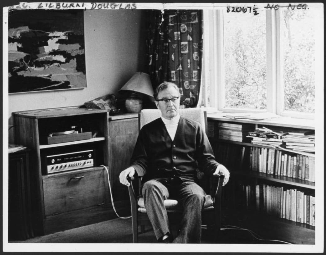 Douglas Lilburn in the sitting room of his home at 22 Ascot Terrace, Thorndon, Wellington, circa 1970.