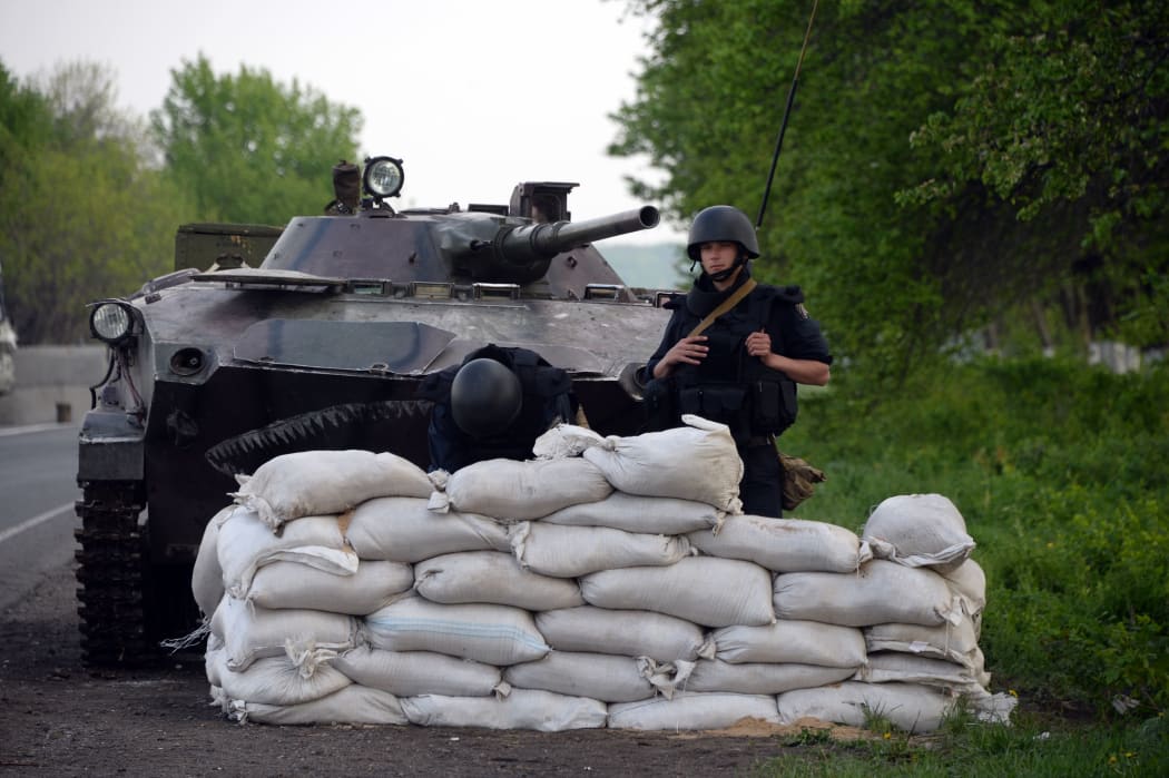 A Ukranian soldier at a checkpoint in Sloviansk.