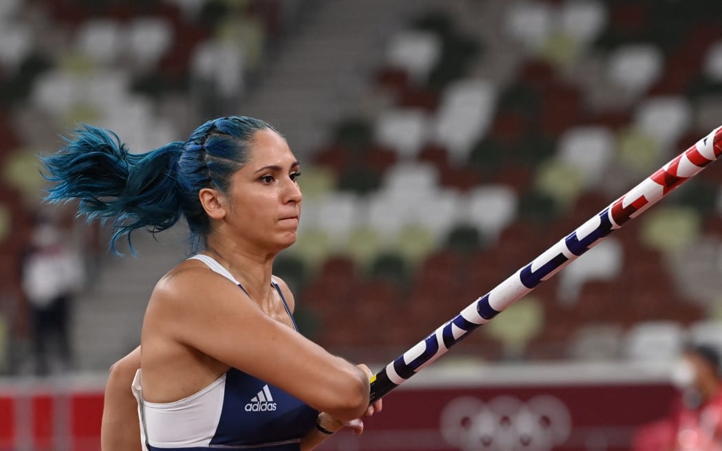 Greece's Eleni-Klaoudia Polak competes in the women's pole vault qualification during the Tokyo 2020 Olympic Games at the Olympic Stadium in Tokyo on August 2, 2021. (Photo by Andrej ISAKOVIC / AFP)