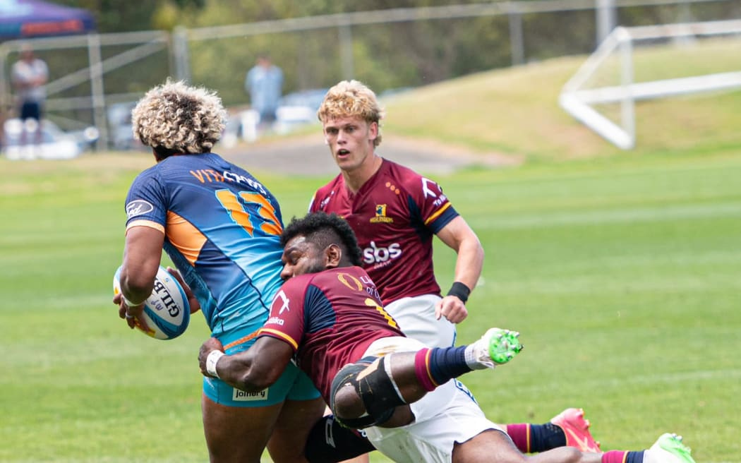 Highlanders Timoci Tavatavanawai tackles his opposite, Moana Pasifika's Fine Inise at North Harbour Stadium on Friday in a pre-season Super Rugby Pacific clash. The Highlangers won 26-21. Photo: Highlanders
