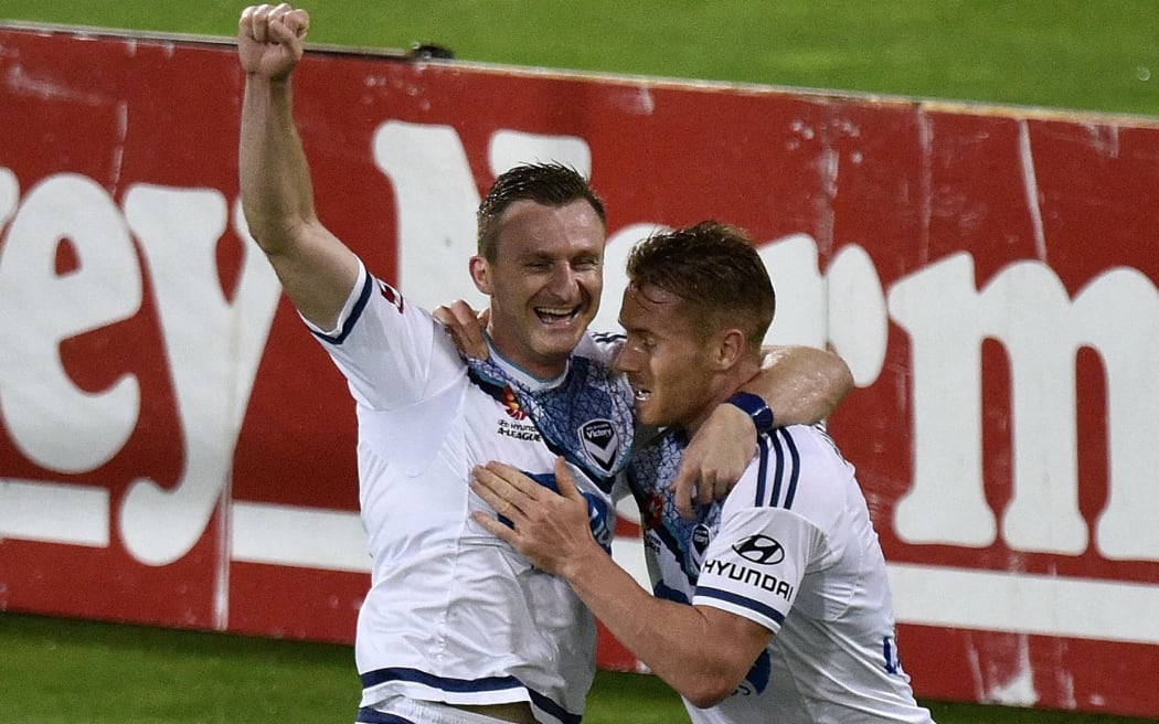 Besart Berisha (L) celebrates a goal team mate Oliver Bozanic
