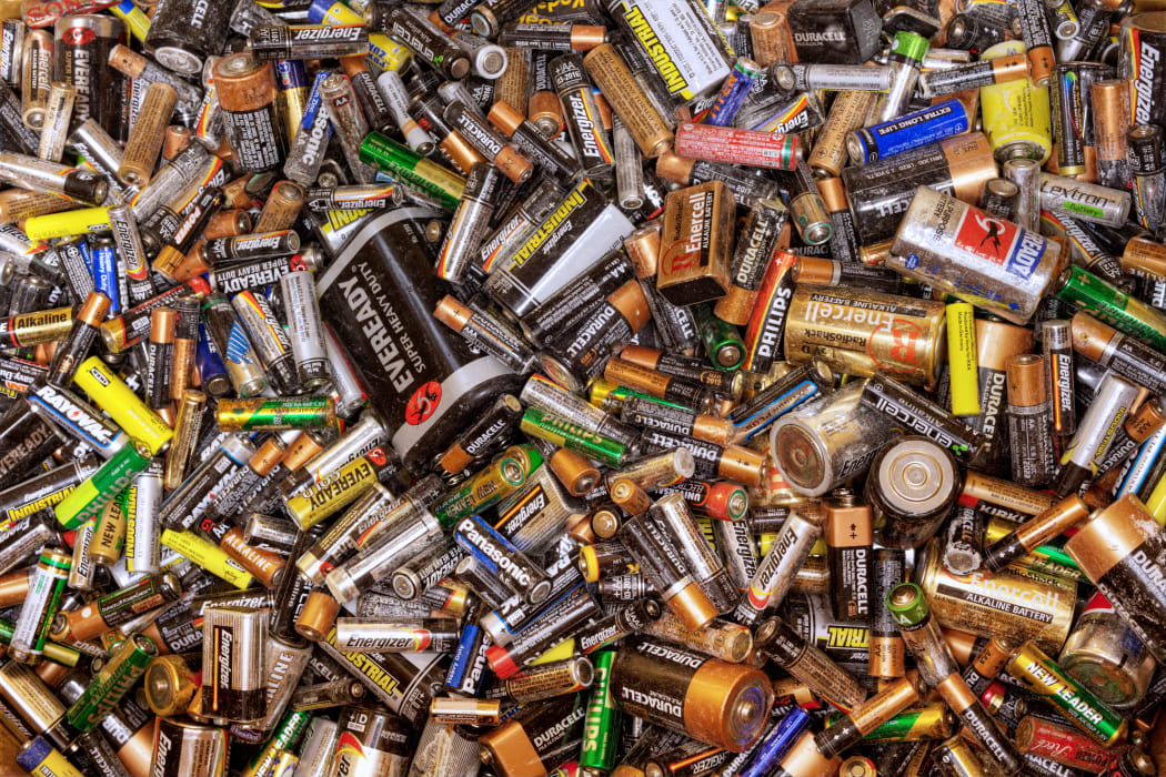 Many dead batteries gathered for recycling.