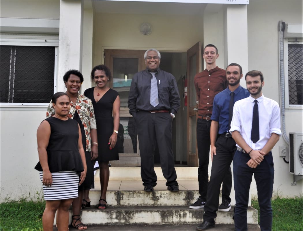 Vanuatu Olympic Committee CEO Henry Tavoa (c) with fellow VASANOC staff.