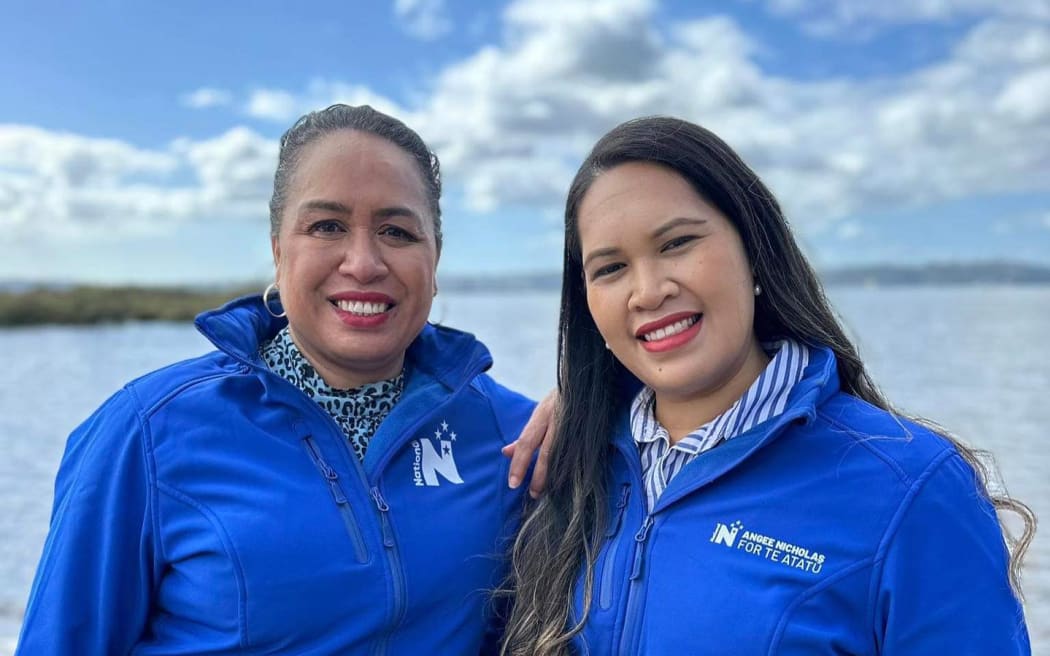 Angee Nicholas (standing right) with fellow National party member Fonoti Agnes Loheni