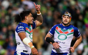 Tom Ale of the Warriors celebrates after scoring a try