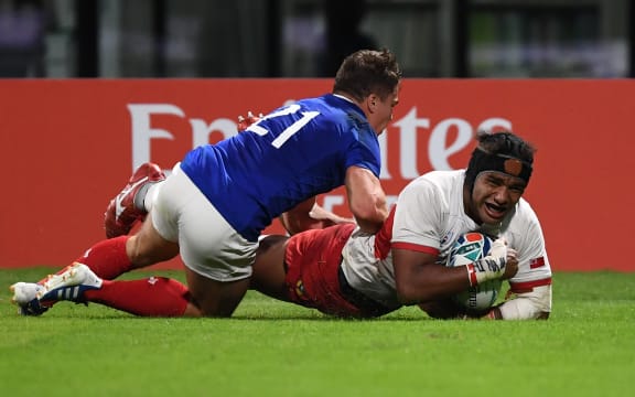Tonga's Zane Kapeli scored with 90 seconds remaining to set up a grandstand finish.