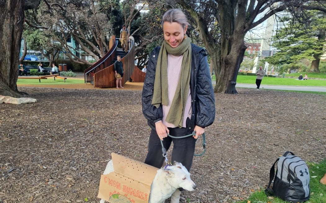 Shadoe and dog Olive at the climate protest at Victoria Park.