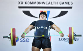 Iuniarra Sipaia of Samoa competes in the women's +75kg final during the 2014 Commonwealth Games.