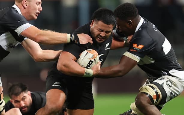 Asafo Aumua charges at the defence.