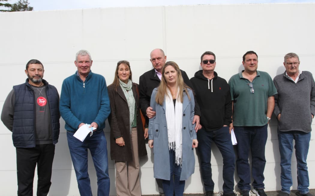 From left: Dean Brunell from Chelsea Park Motor Lodge, Phil Neal from Greens Motel, Hospitality New Zealand regional manager Kim Odendaal, Rick and Stacie Warren from Century Park Motor Lodge; Andy Millener from Arcadia Motel, Shaun Jones from Tudor Lodge; and David Hale from Arrow Motel are angry with their significant commercial rates increases.