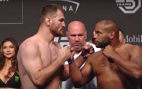 Stipe Miocic (left) and Daniel Cormier at the weigh-in.
