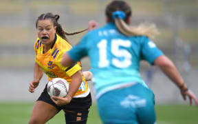 Teilah Ferguson in action for the Hurricanes Poua.