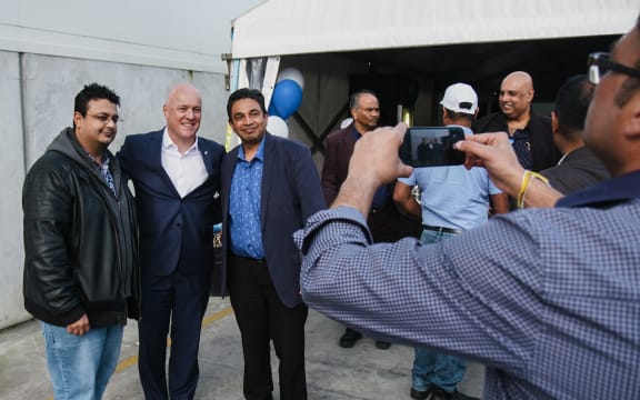 Christopher Luxon meeting local residents at Otara business Universal Granite
