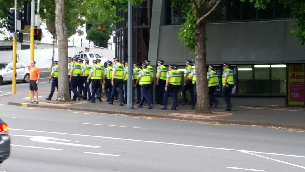 Police on the way to Sky City ahead of the TPP signing.