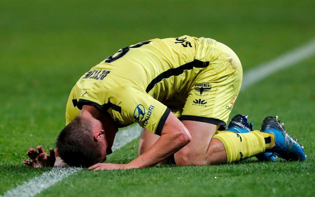 Cameron Devlin of the Phoenix is injured during the A-League match,  Wellington Phoenix v Newcastle Jets at Netstrata Jubilee Stadium , Thursday 13th August 2020 Copyright Photo: David Neilson / www.photosport.nz