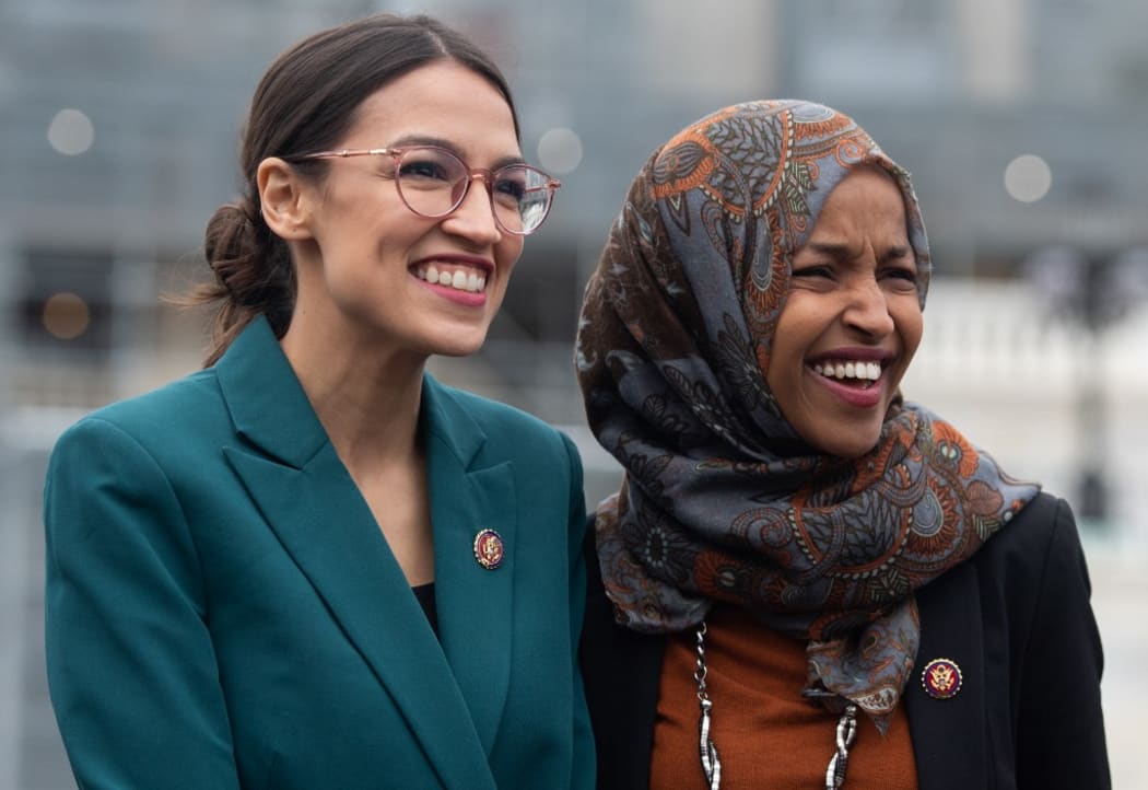 File photo of Representative Alexandria Ocasio-Cortez, and Ilhan Omar (R) - two of the members of Congress President Trump has attacked.