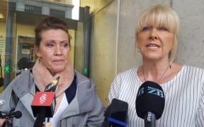 Sharon Comerford's identical twin sister Jacqui Comerford (left), and sister Debi Ogle (right).