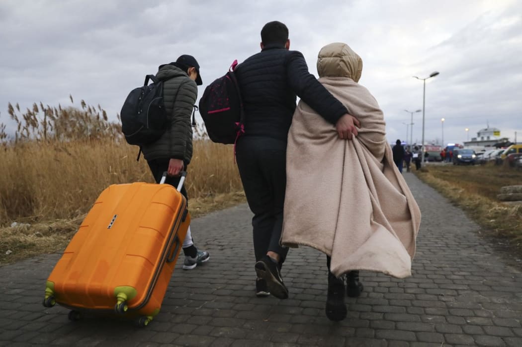 Refugees from Ukraine are seen after crossing Ukrainian-Polish border due to Russian military attack on Ukraine. Medyka, Poland on February 25, 2022.