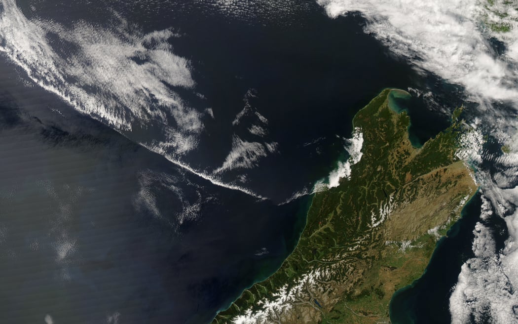 The Alpine Fault is marked out on satellite images by the western edge of the Southern Alps snowline.