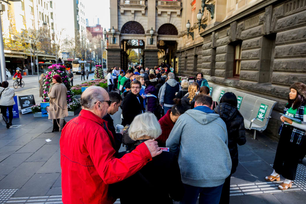 Voters line up to cast their vote at Melbourne town hall polling place on election day to determine all 226 members of the 45th Parliament of Australia in Melbourne, Australia on July 2, 2016.