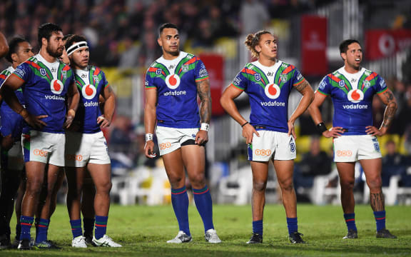 Peta Hiku, Jazz Tevaga, Ken Maumalo, Chanel Harris-Tavita and Gerard Beale watch the replay scoreboard screen during the Warriors match against the North Queensland Cowboys on Saturday.