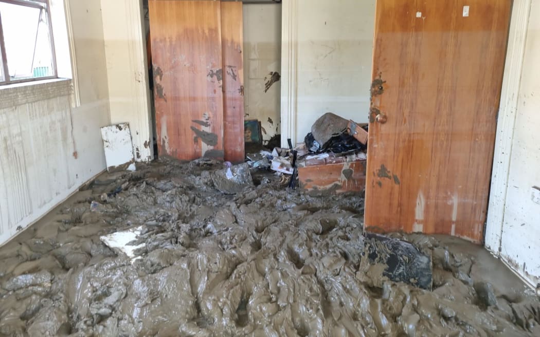 Ethan Cross and Lily Fearn's cyclone hit property in North Shore Road on the flat in Eskdale, Hawke's Bay. Flooding reached top of doorway in hallway
