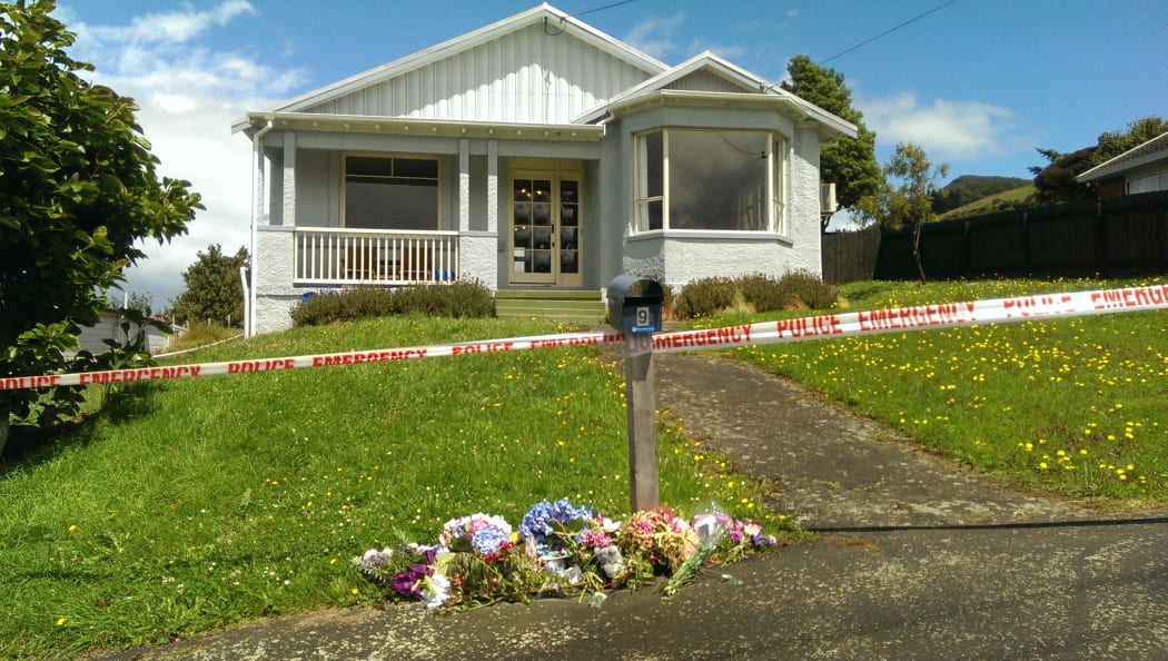 Neighbours and friends left flowers on Friday.
