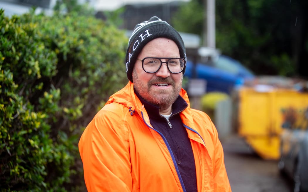 David Fraser found his car perched on a fence after flash flooding in Wellington.