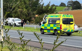 Emergency services at the scene of a horror crash on Auckland's State Highway 1 near Ramarama on 26 August 2024.